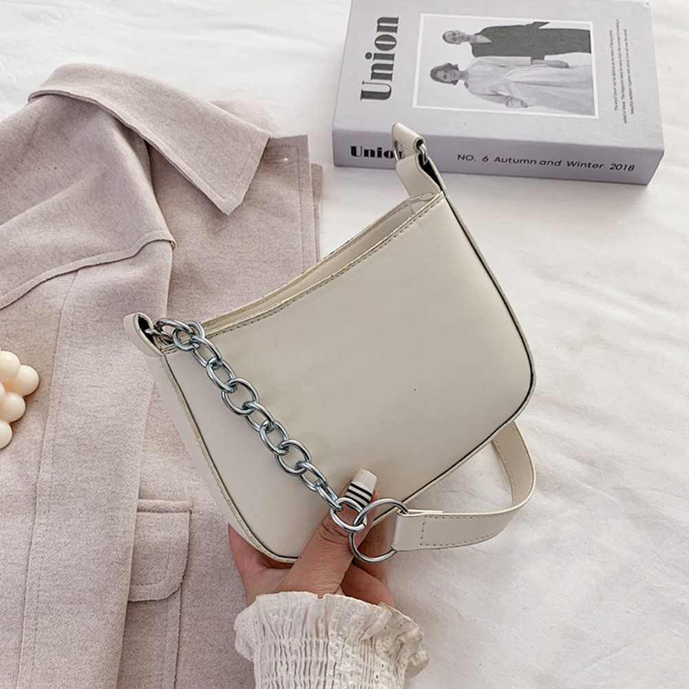 תיק יד בעיצוב רצועה חצי ברזל